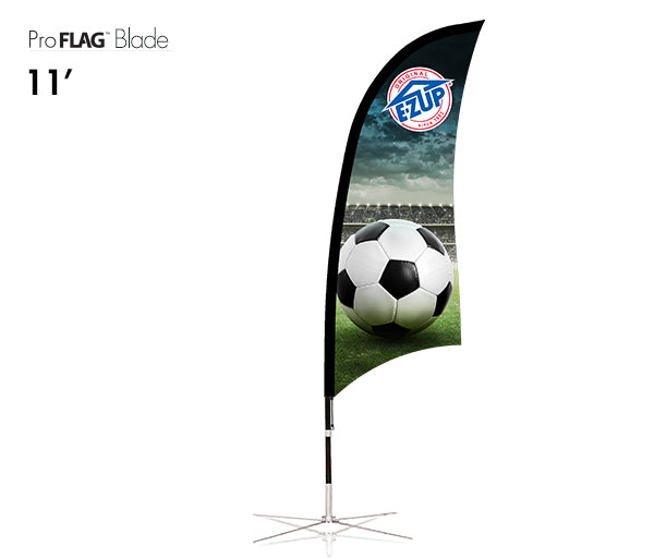 A teardrop-shaped flag with a soccer ball and the brand 'E-Z UP' displayed prominently. The flag is set up outdoors on a pole.