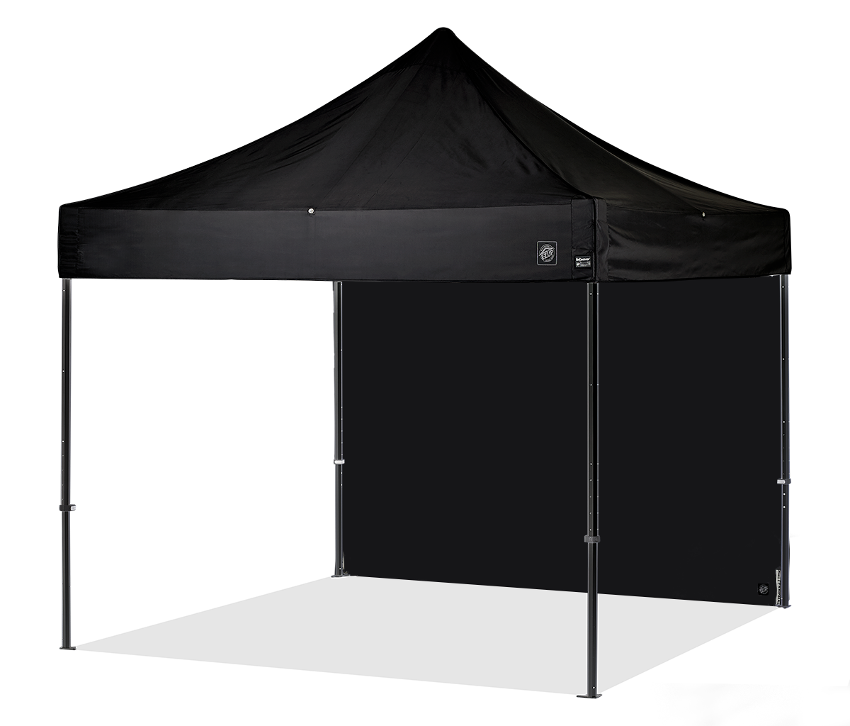 A black portable shelter with an aluminum frame and a covering fabric, designed for outdoor events such as trade shows and corporate gatherings.