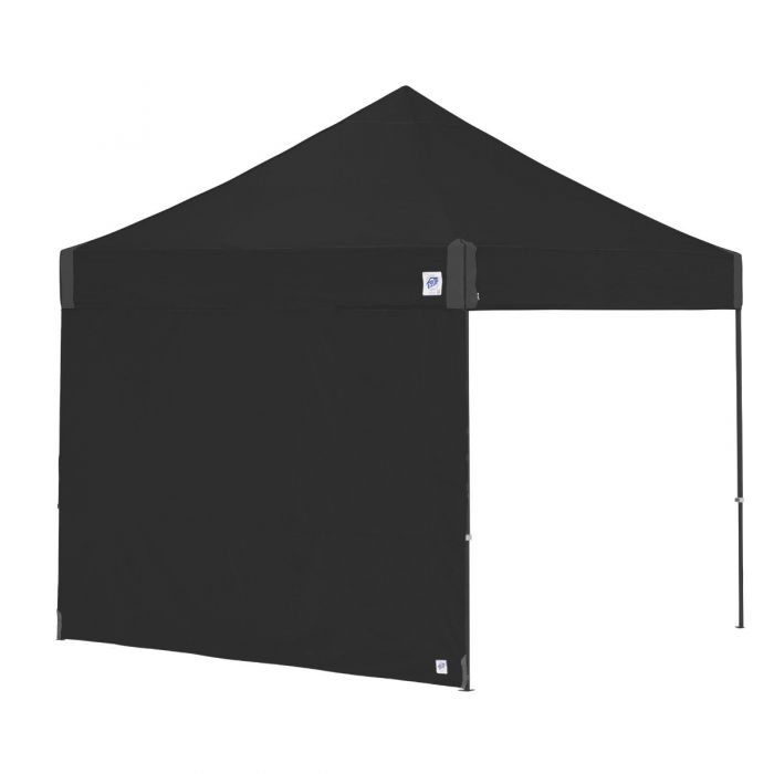 A black sidewall attached to an EZUP Gazebo shelter, providing shade and privacy.